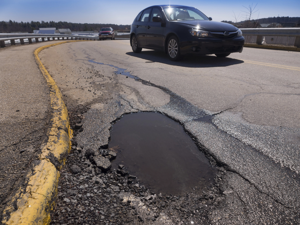 potholes paskett auto
